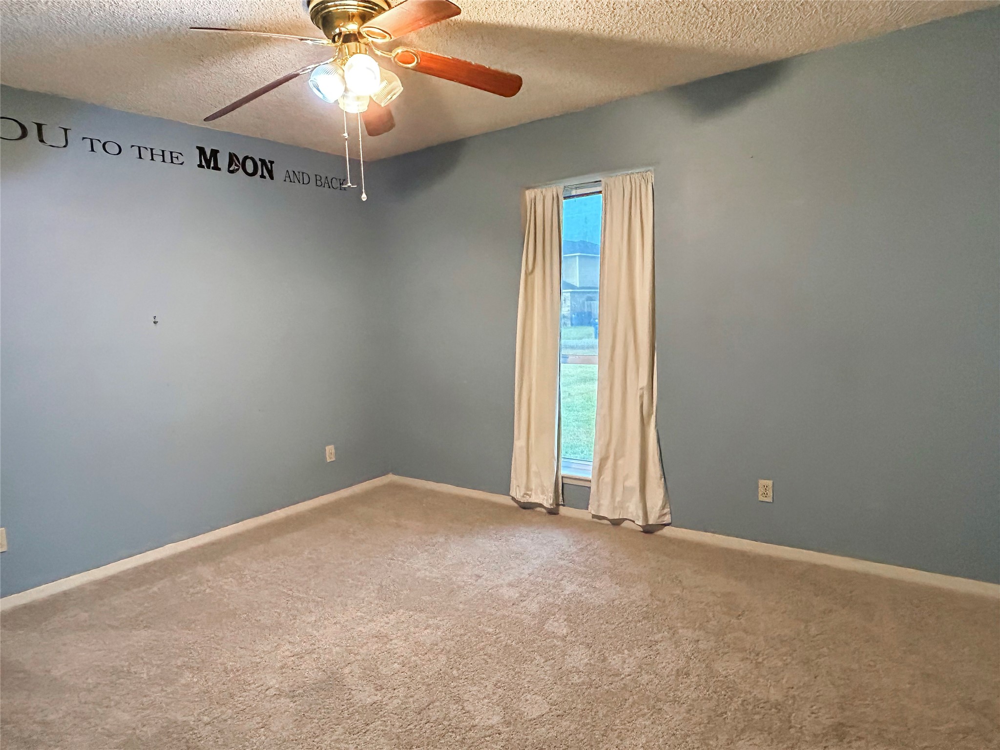 6132 Fox Ridge Drive Angleton, TX 77515 - Photo 18 of 28 an empty room with windows and fan
