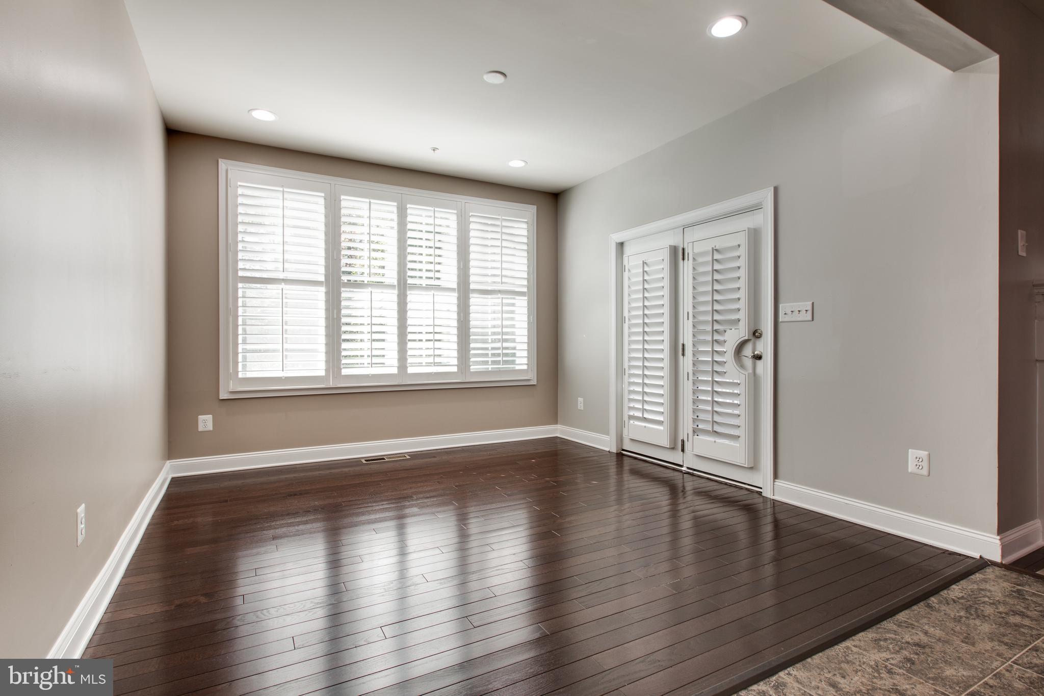 2265 Brimstone Place Hanover, MD 21076 - Photo 24 of 70 wooden floor in an empty room with a window