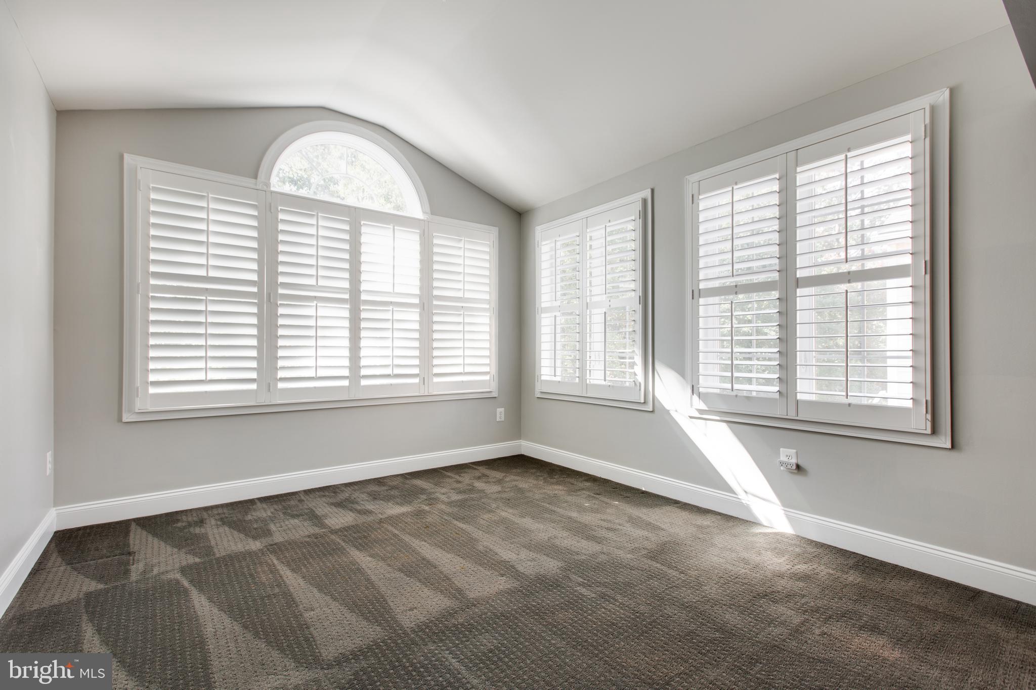 2265 Brimstone Place Hanover, MD 21076 - Photo 31 of 70 a view of an empty room with a window