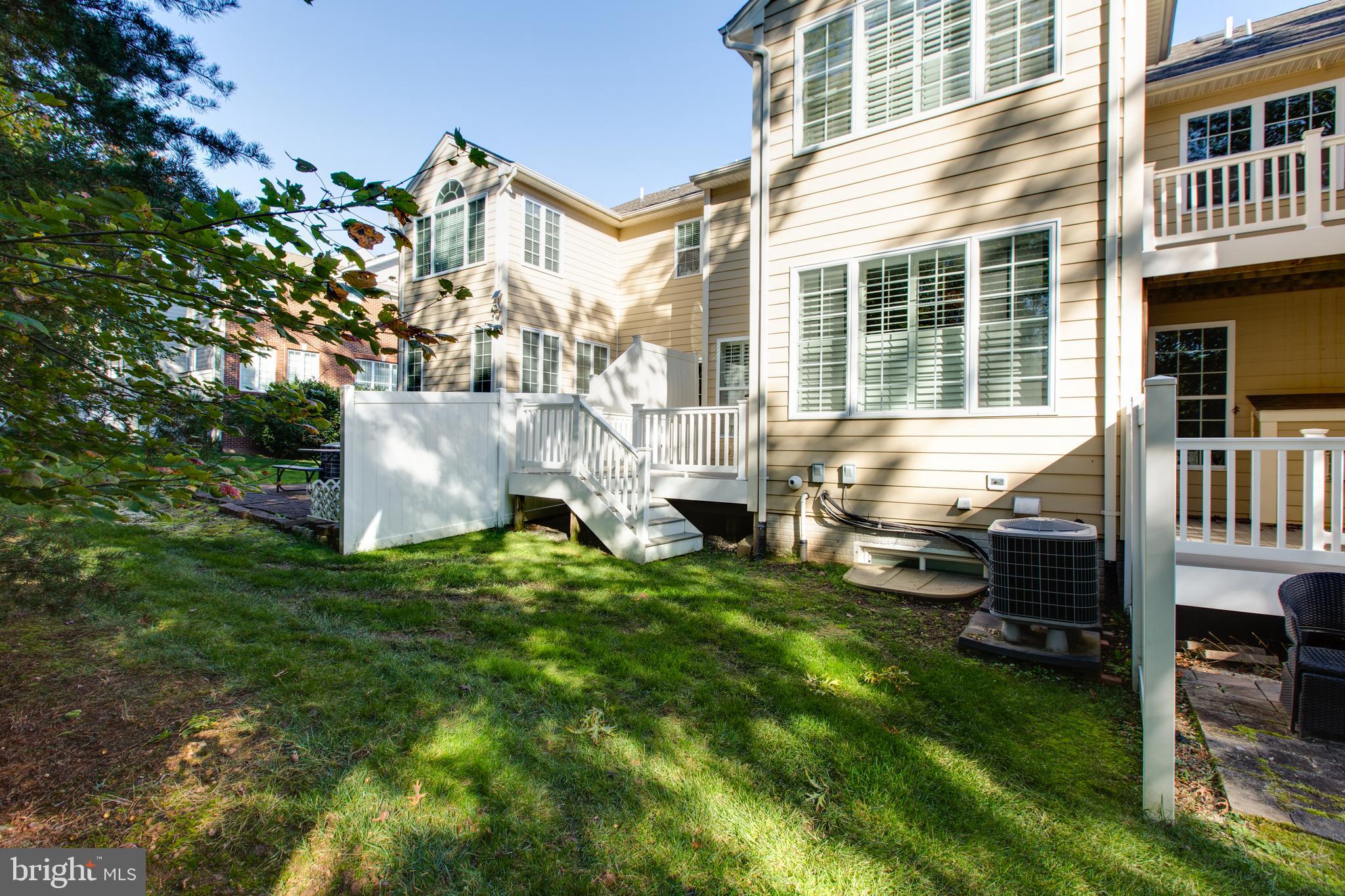 2265 Brimstone Place Hanover, MD 21076 - Photo 47 of 70 a front view of a house with a yard