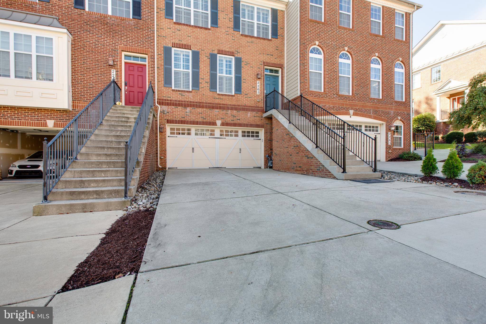 2265 Brimstone Place Hanover, MD 21076 - Photo 7 of 70 a view of a building with many windows