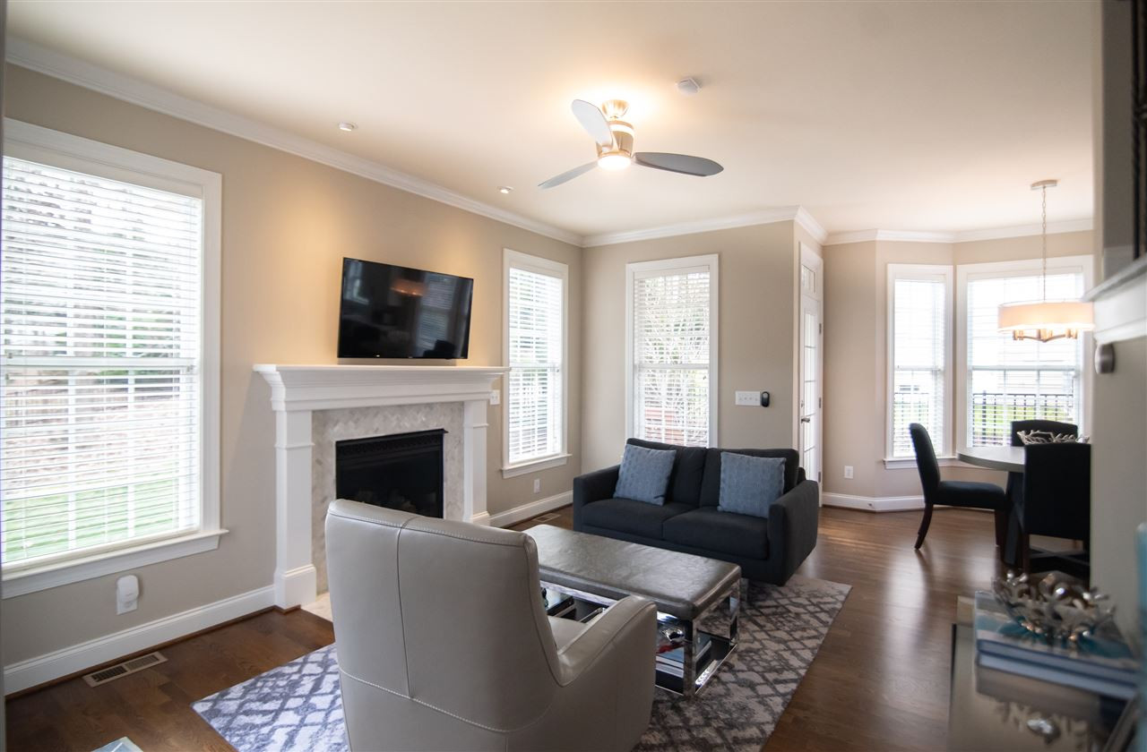 9311 Tabriz Point Raleigh, NC 27614 - Photo 7 of 25 The family room opens nicely to the kitchen, so you never miss a beat when enjoying time with family and friends. Family Room