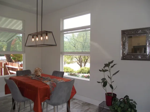 a view of room with window and hallway