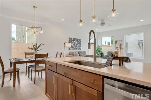 a kitchen with counter space cabinets and appliances