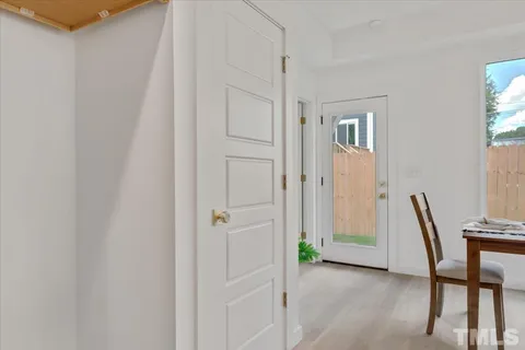 a view of a room with table and chair