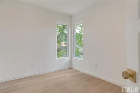 an empty room with windows