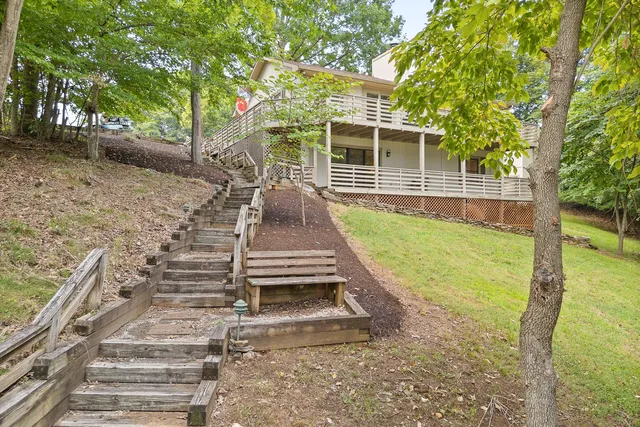 a view of a house with backyard