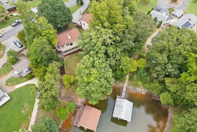 an aerial view of house with yard