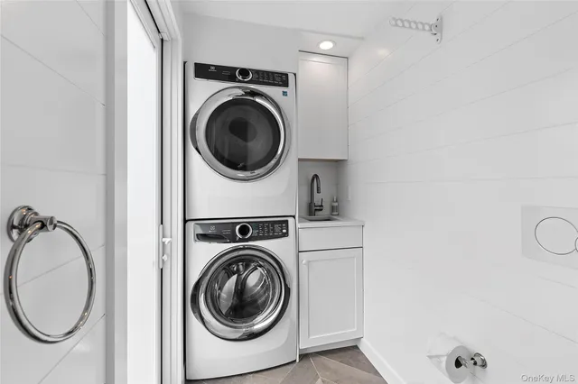 a utility room with dryer and washer