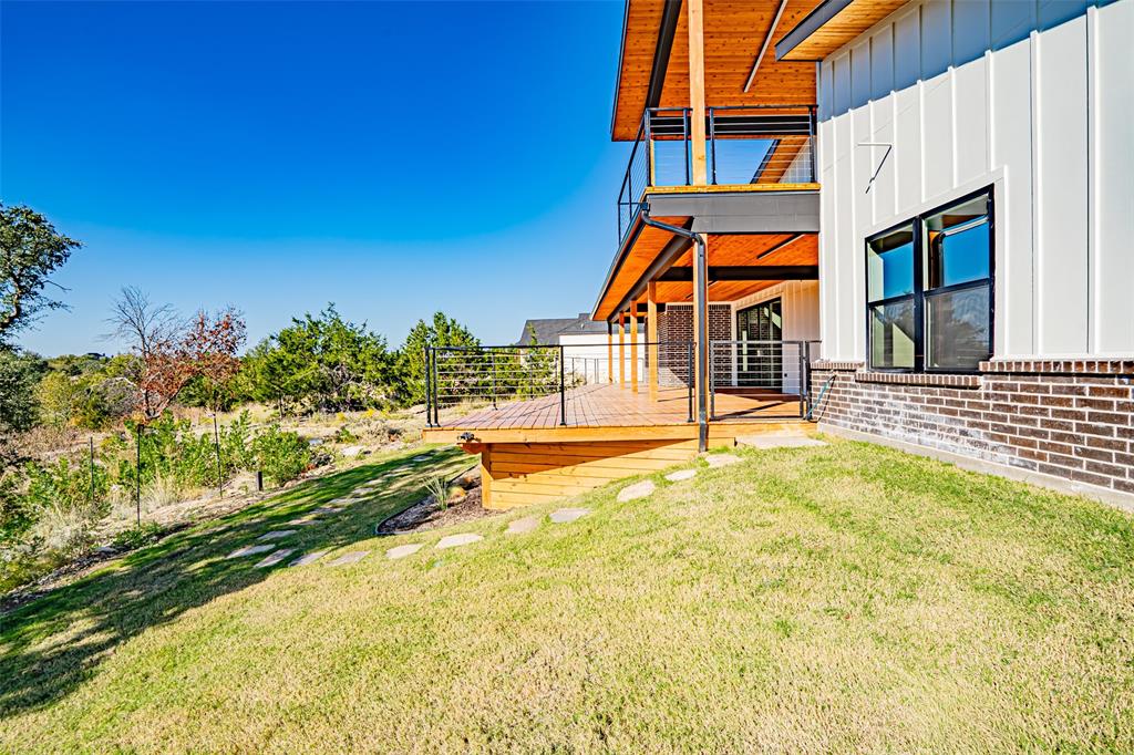 2128 Eagles Rdg Drive Weatherford, TX 76087 - Photo 19 of 39 View of grassy yard featuring a deck