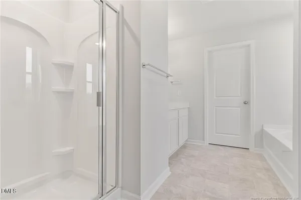 a view of a bathroom with a bathtub