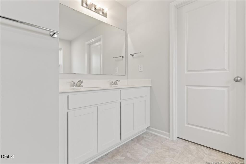 108 Rubyfield Court Fremont, NC 27830 - Photo 19 of 33 a bathroom with a sink and a mirror
