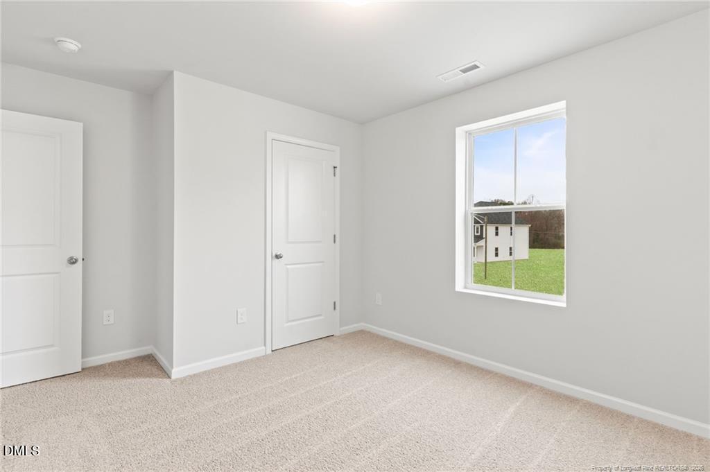 108 Rubyfield Court Fremont, NC 27830 - Photo 23 of 33 an empty room with windows
