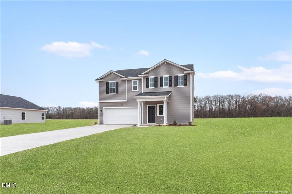 108 Rubyfield Court Fremont, NC 27830 - Photo 2 of 33 a view of a house with a big yard and a large tree