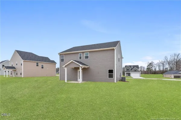 front view of house with a yard