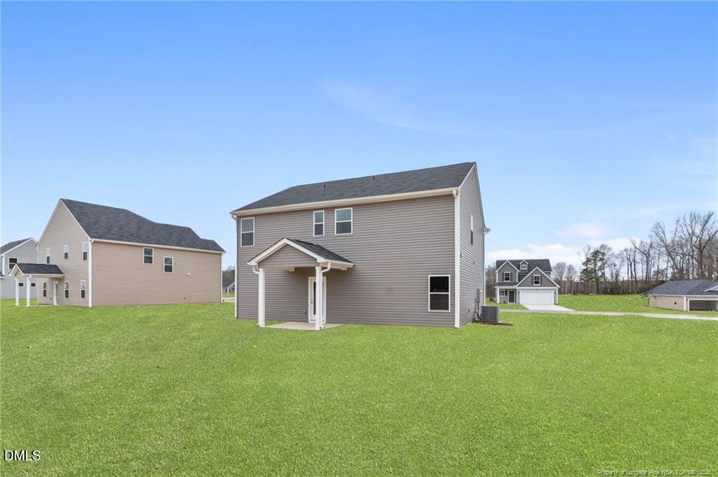 108 Rubyfield Court Fremont, NC 27830 - Photo 29 of 33 front view of house with a yard