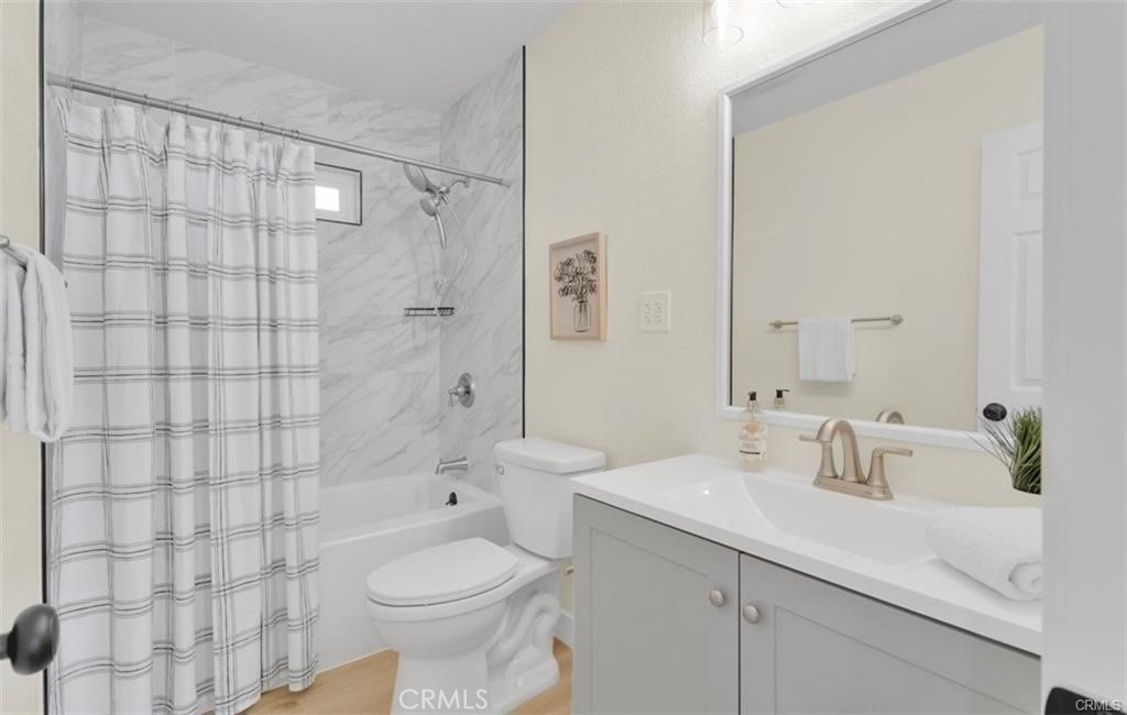 351 Armory Road Barstow, CA 92311 - Photo 16 of 35 a bathroom with a sink toilet and shower