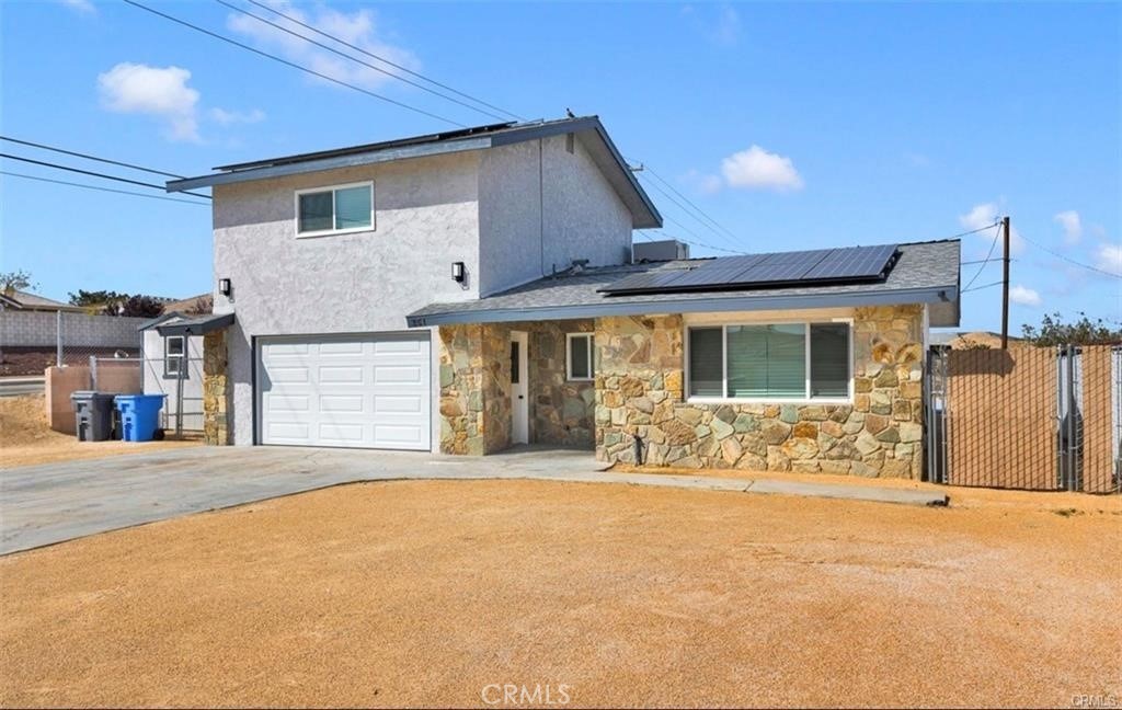 351 Armory Road Barstow, CA 92311 - Photo 2 of 31 a front view of a house with patio