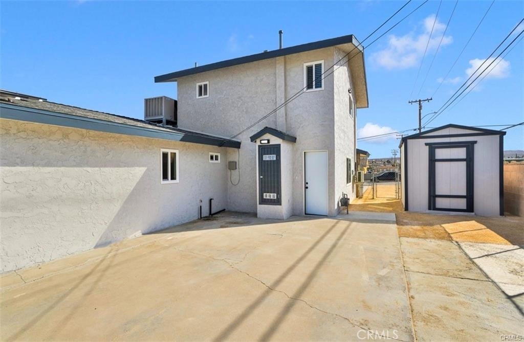 351 Armory Road Barstow, CA 92311 - Photo 22 of 35 a front view of a house with a yard