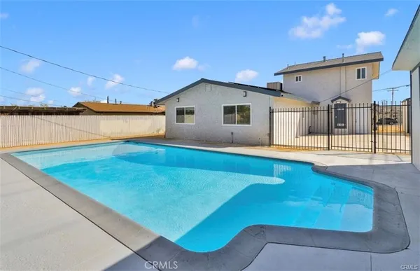 an empty room with large window