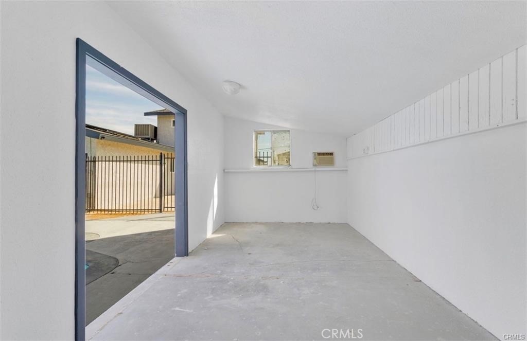 351 Armory Road Barstow, CA 92311 - Photo 25 of 31 a view of an empty room with a window