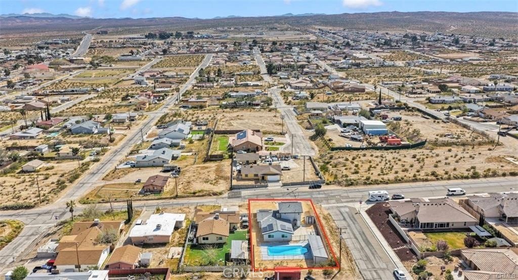351 Armory Road Barstow, CA 92311 - Photo 32 of 35 an aerial view of residential building and parking space