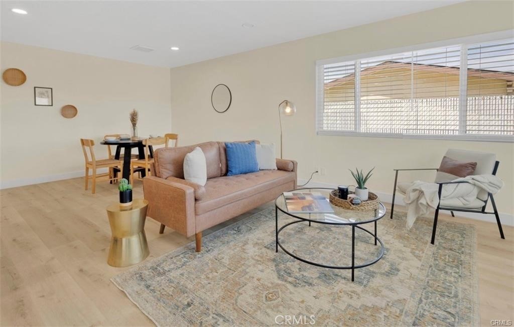 351 Armory Road Barstow, CA 92311 - Photo 7 of 35 a living room with furniture and a window