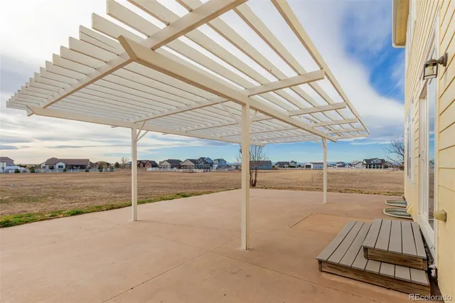 an aerial view of a house with a ocean view