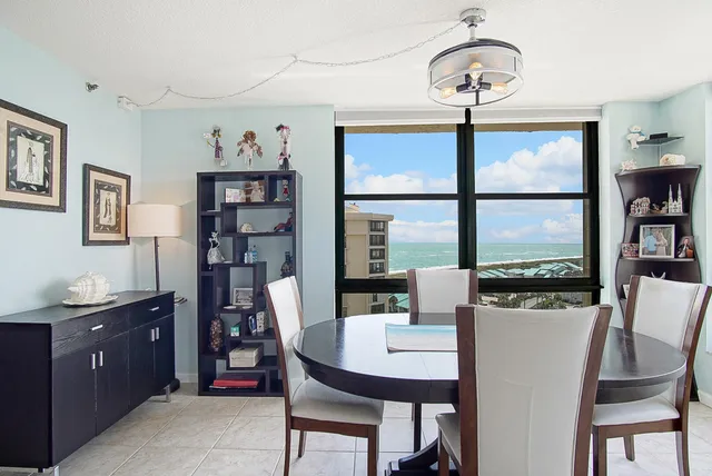 a kitchen with stainless steel appliances a stove top oven a sink a counter space and cabinets