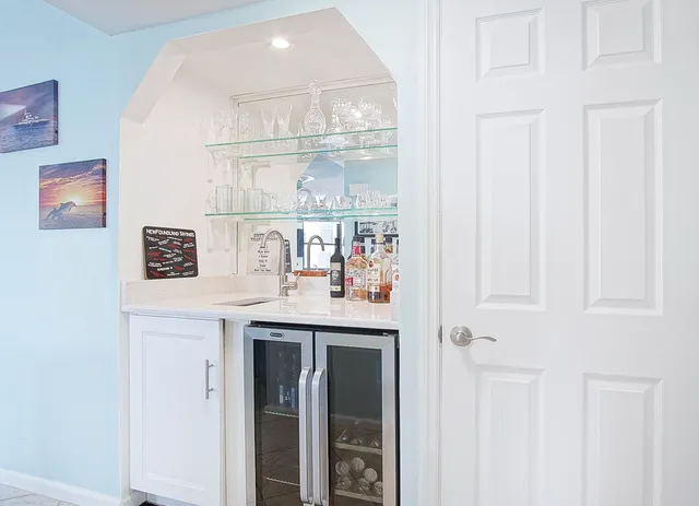 a kitchen with stainless steel appliances a refrigerator stove and microwave