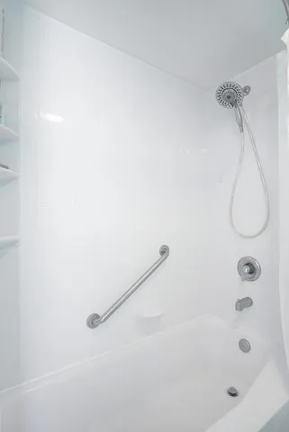 an aerial view of a house with outdoor space