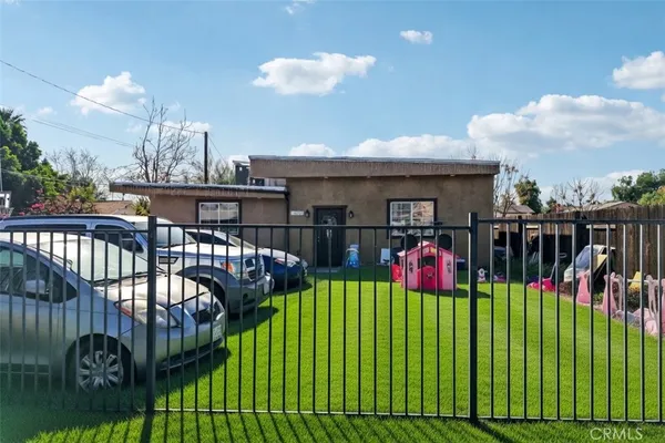 a view of a chairs and tables in the balcony