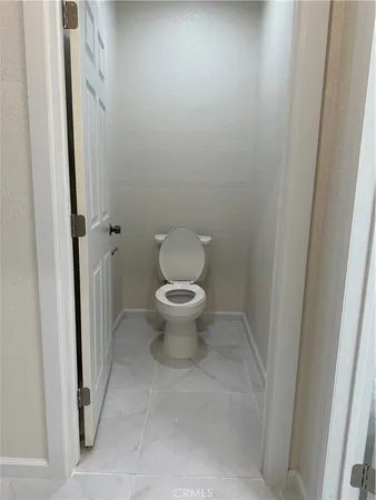 a bathroom with a toilet