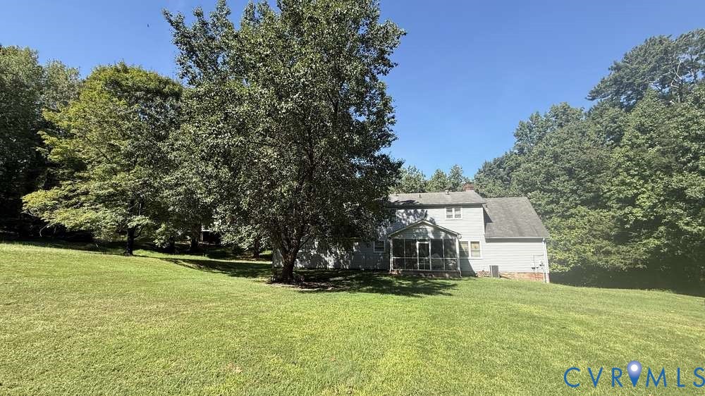 320 Wilson Road Danville, VA 24541 - Photo 2 of 17 Expansive lawn with mature trees and a screened po