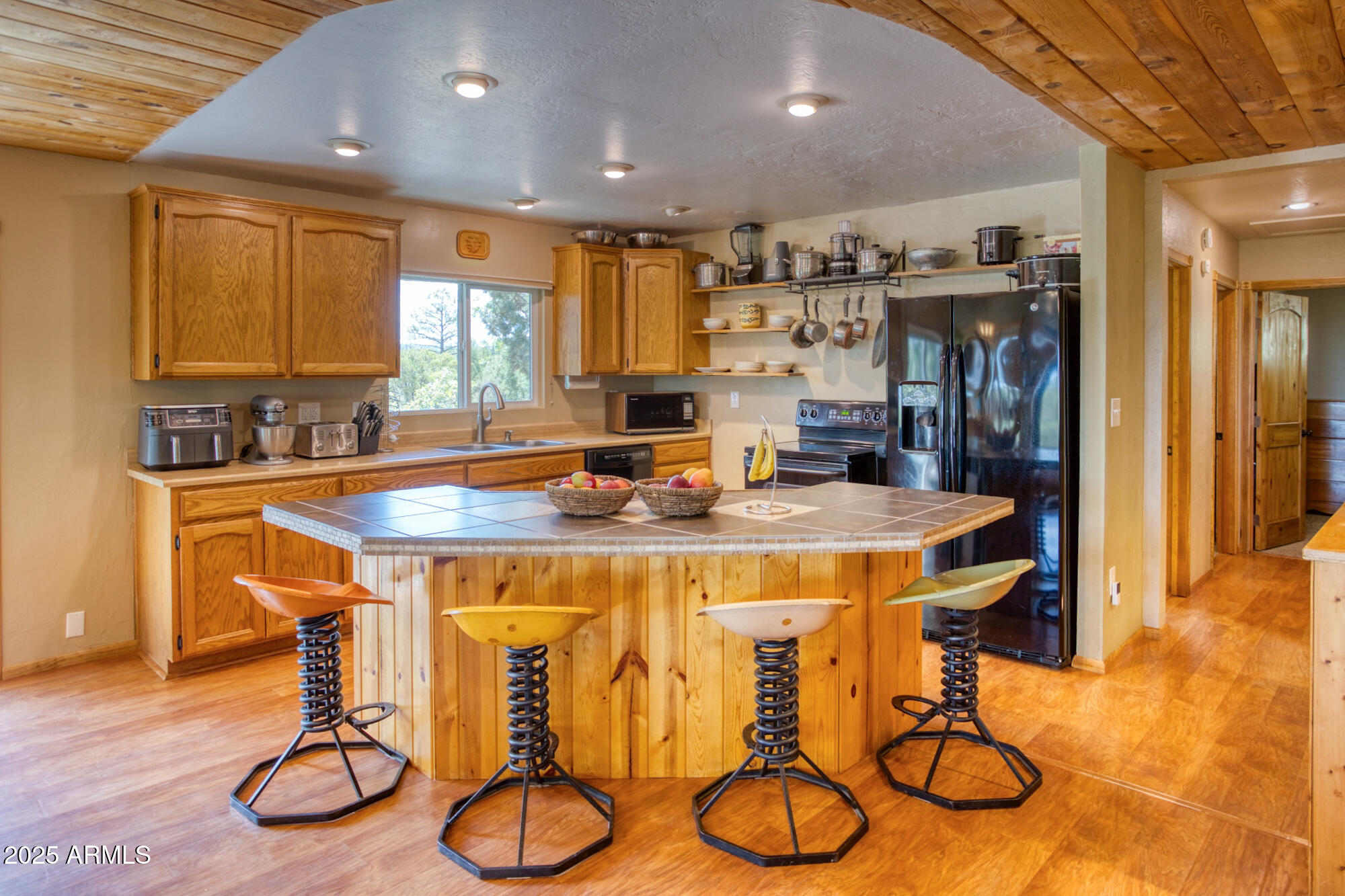 2611 Ellsworth Avenue Show Low, AZ 85901 - Photo 10 of 41 a view of a dining room with furniture