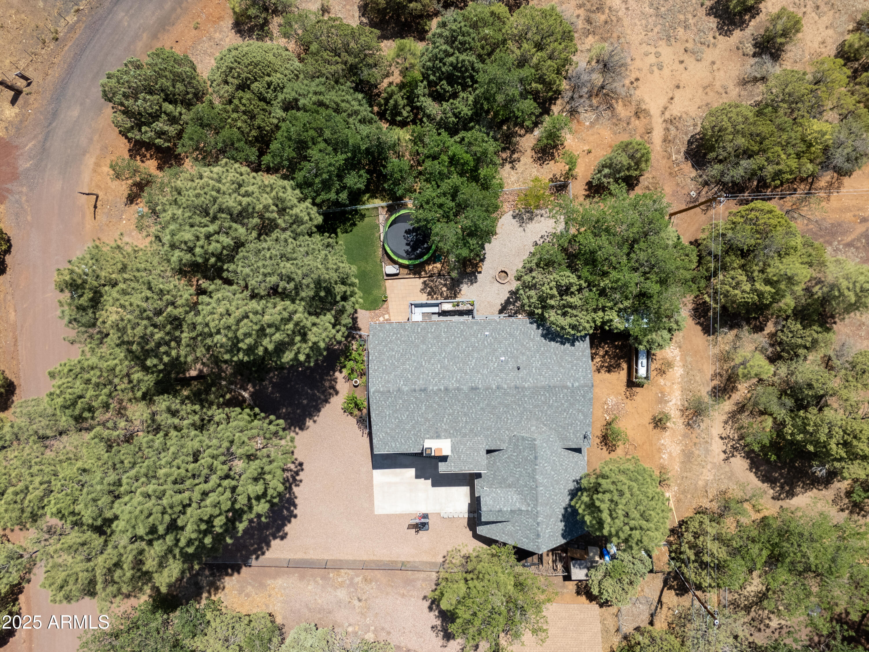 2611 Ellsworth Avenue Show Low, AZ 85901 - Photo 30 of 41 an aerial view of a house with yard