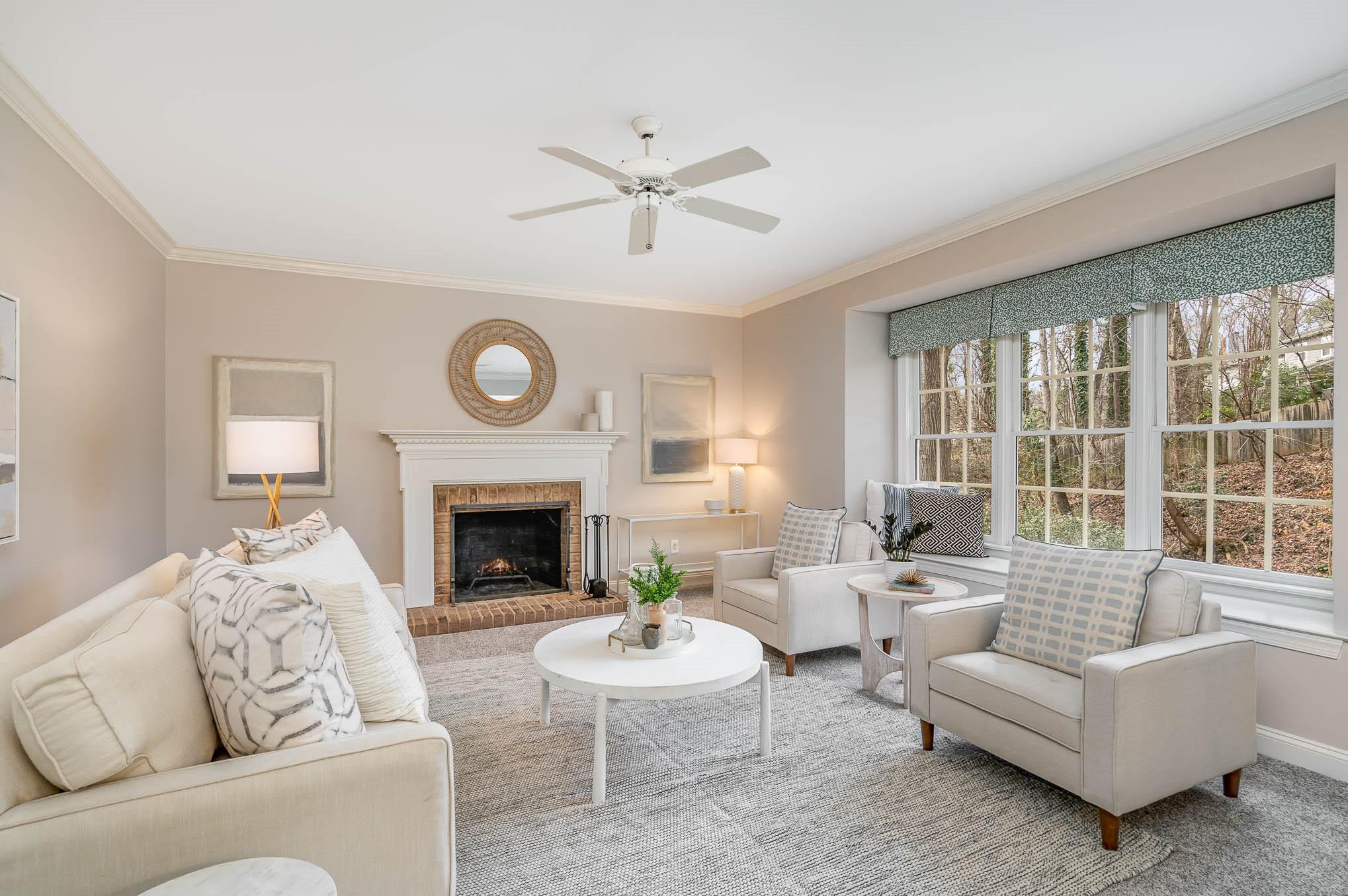3924 Highview Road Charlotte, NC 28210 - Photo 13 of 45 a living room with furniture a fireplace and a large window