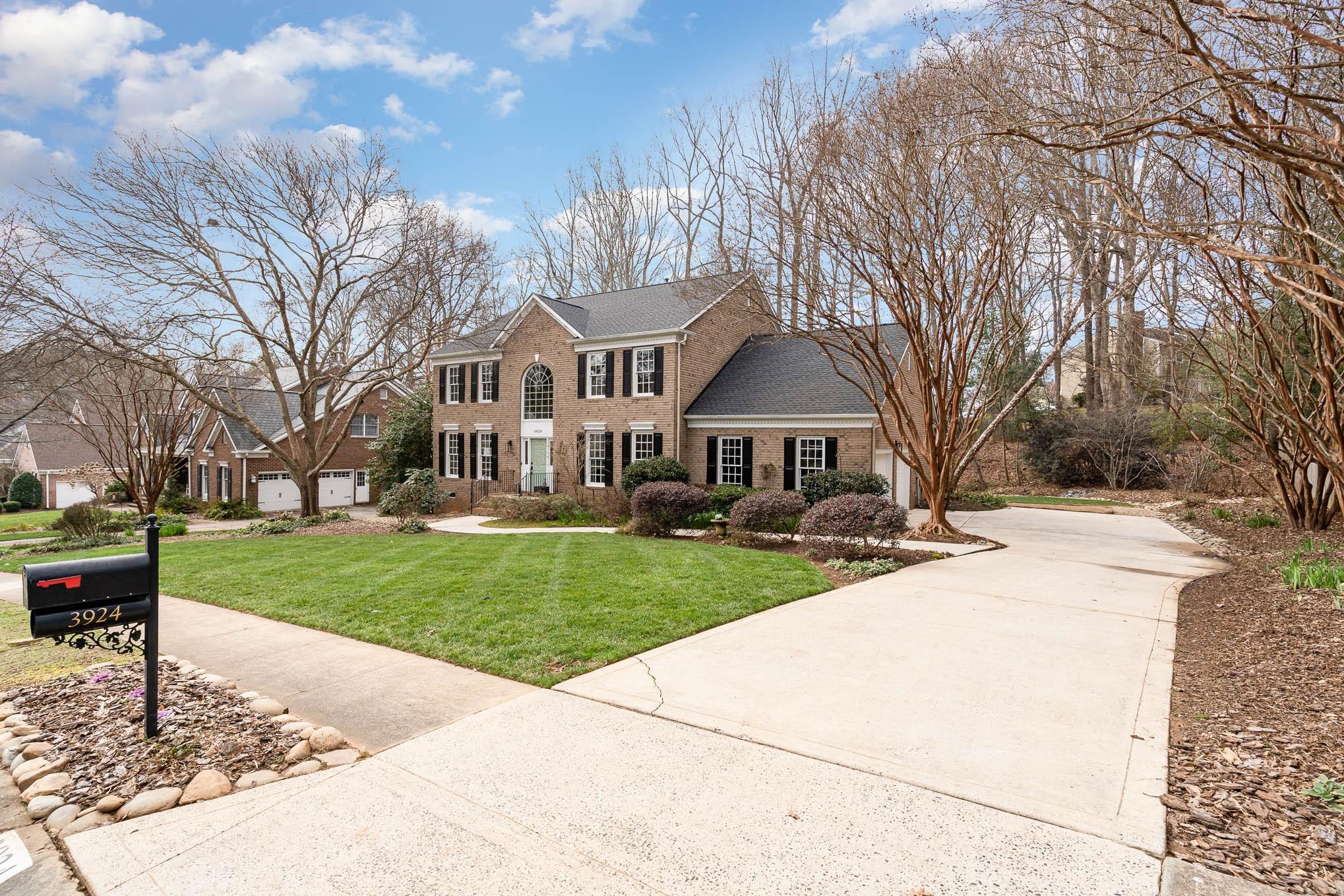 3924 Highview Road Charlotte, NC 28210 - Photo 2 of 45 a front view of a house with yard porch and garden