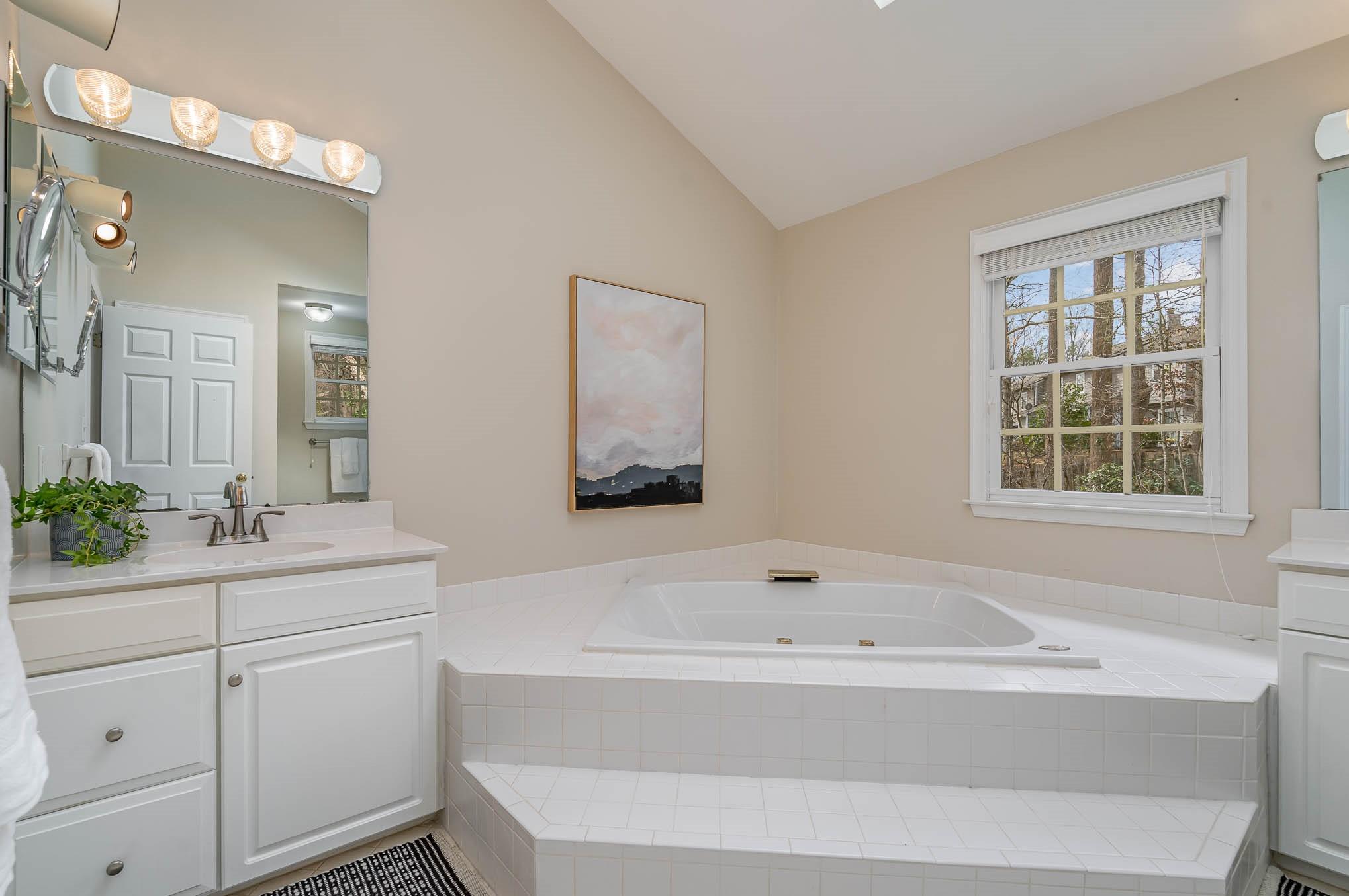 3924 Highview Road Charlotte, NC 28210 - Photo 23 of 45 a bathroom with a bathtub and a sink