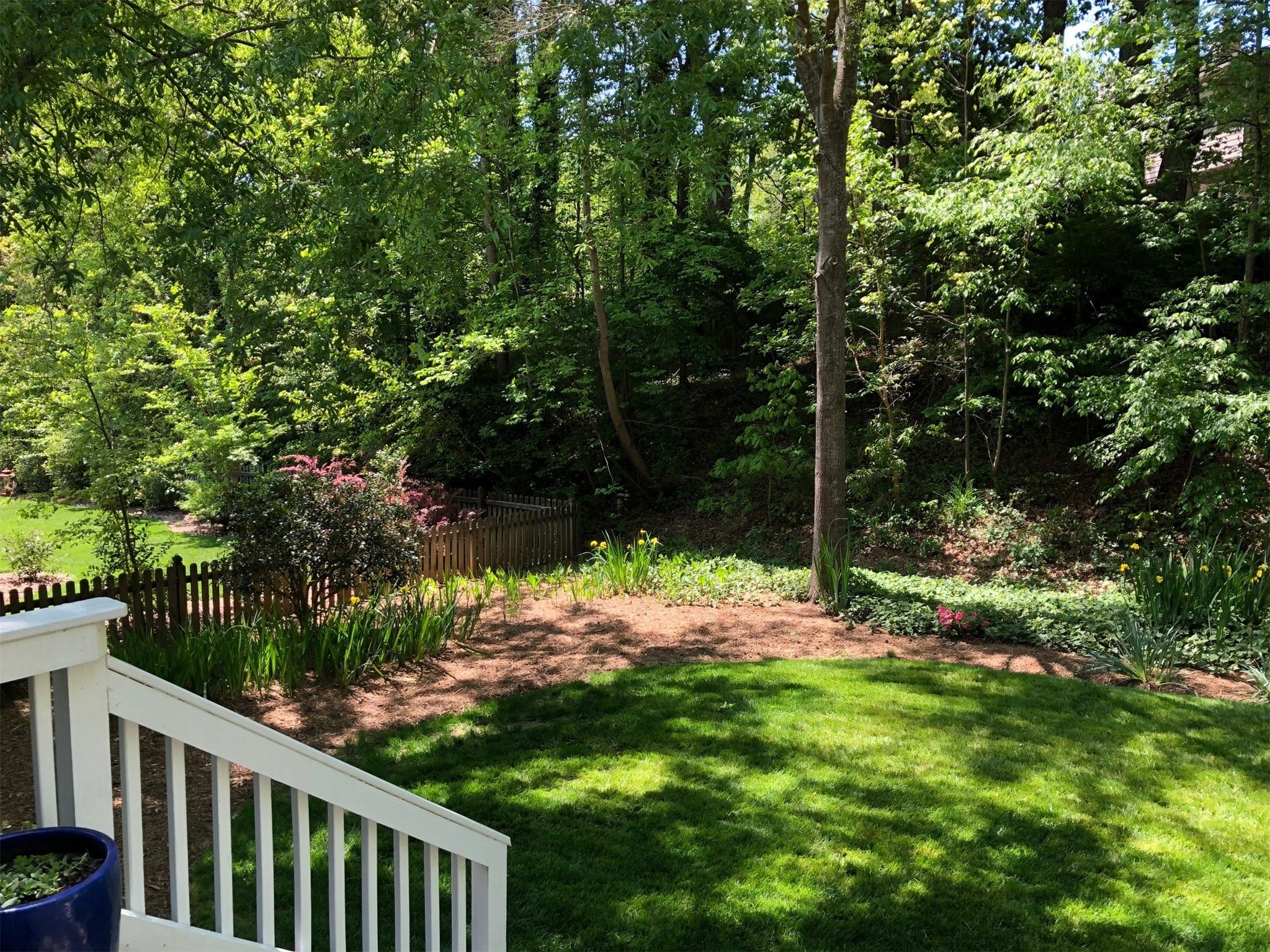 3924 Highview Road Charlotte, NC 28210 - Photo 35 of 45 a wooden fence with trees in the background