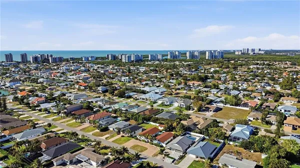 an aerial view of a city with lots of residential buildings