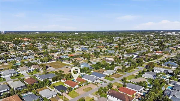 an outdoor space with lots of trees