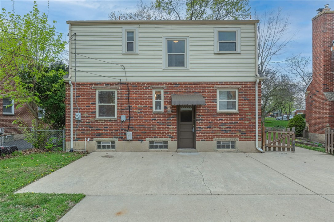 1012 Hampshire Road Dayton, OH 45419 - Photo 39 of 39 This charming home features a mix of brick and siding, offering a classic aesthetic.