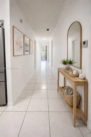 a view of living room with furniture and window