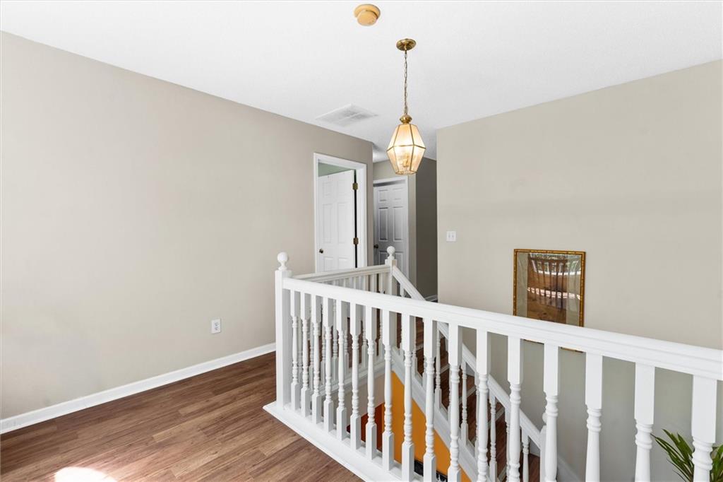3234 Mineral Ridge Lane Stone Mountain, GA 30087 - Photo 25 of 55 a view of a hallway view with staircase