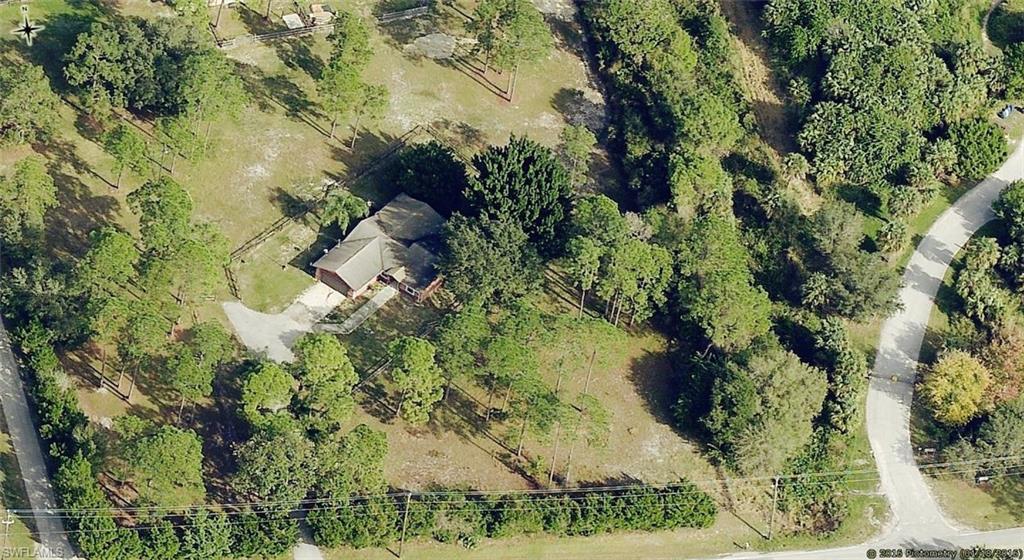 17981 North River Road Alva, FL 33920 - Photo 9 of 25 an aerial view of residential houses with outdoor space