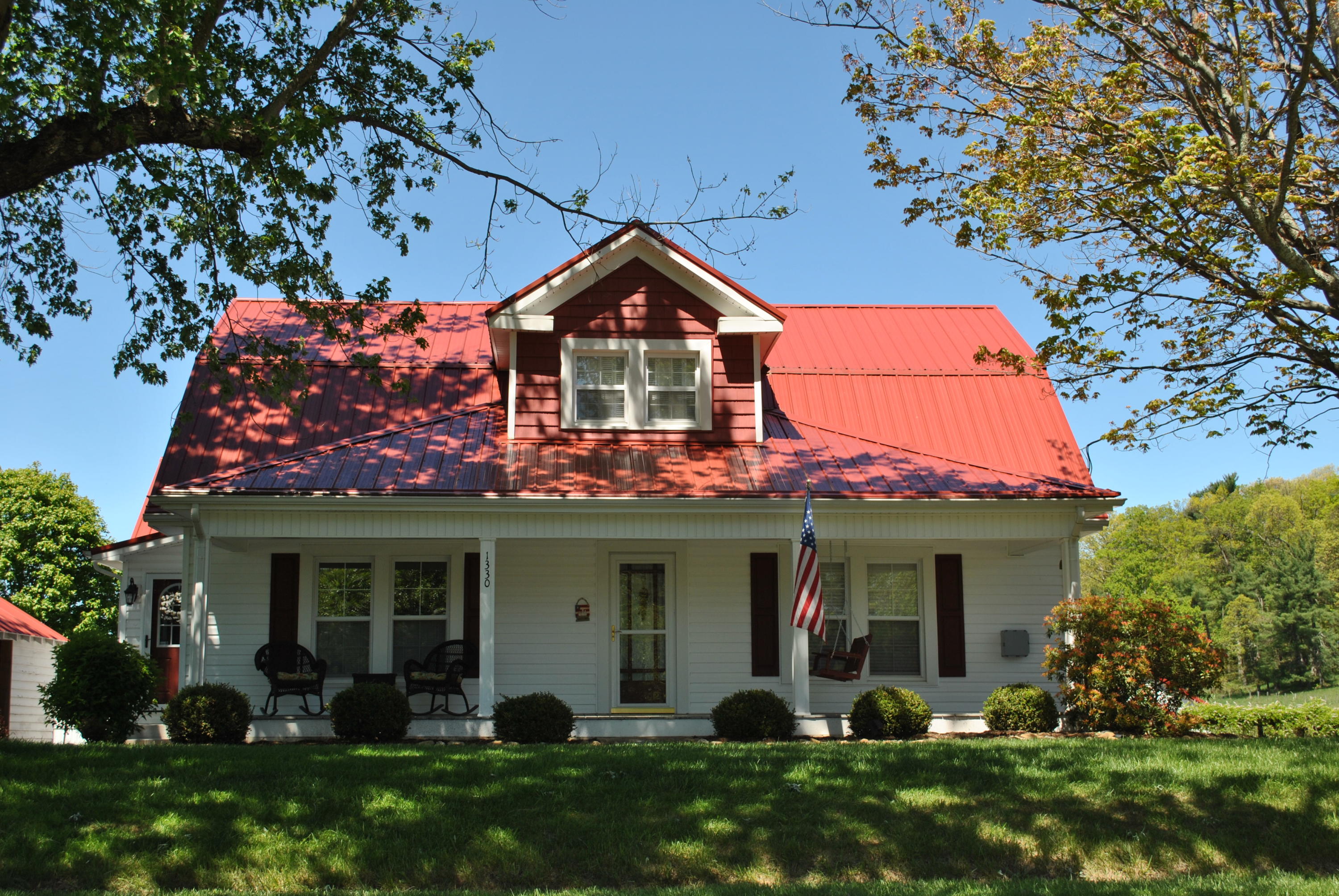 1330 Huffville Road Northeast Pilot, VA 24138 - Photo 2 of 100 front view of a house with a yard