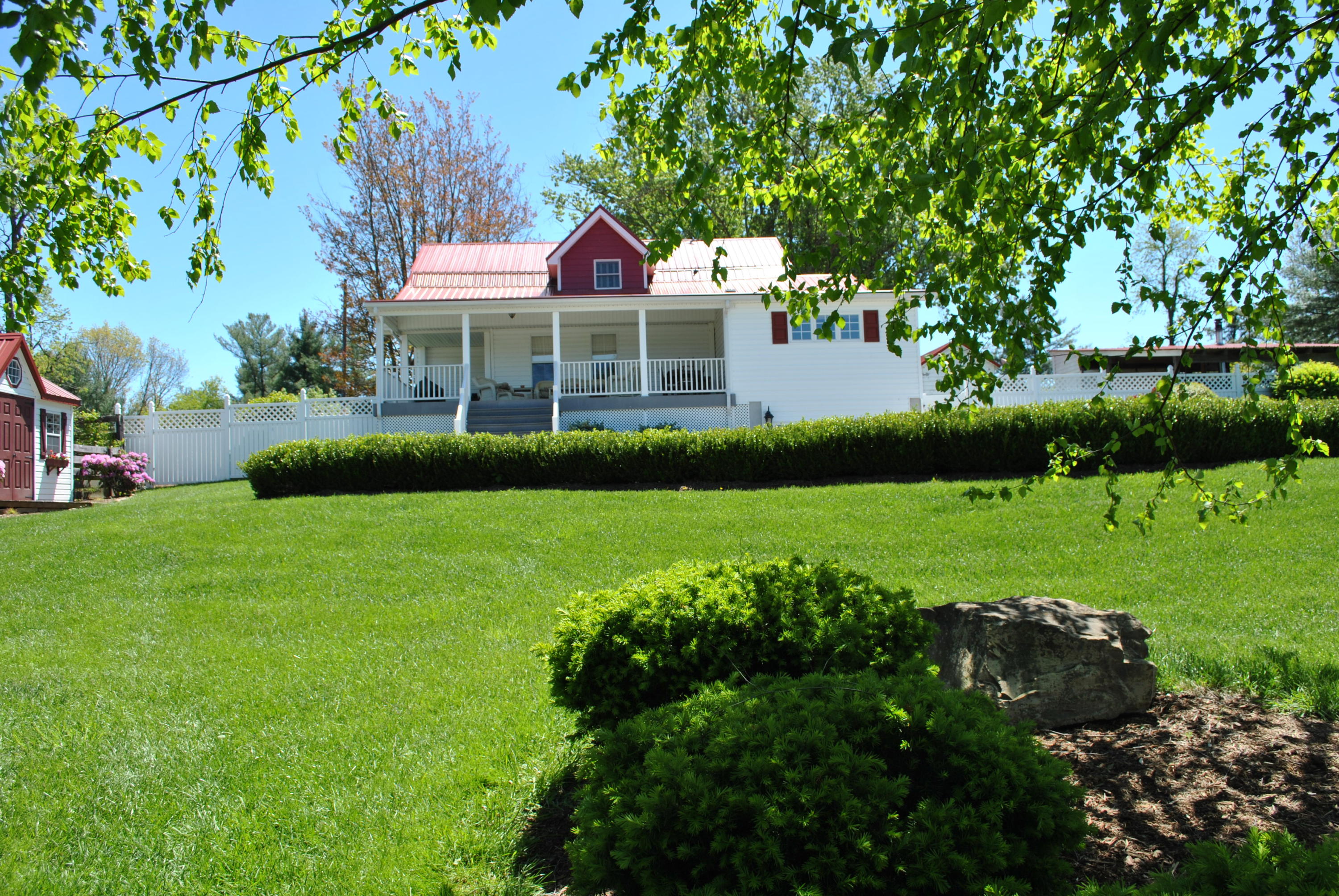 1330 Huffville Road Northeast Pilot, VA 24138 - Photo 21 of 100 a front view of a house with a yard