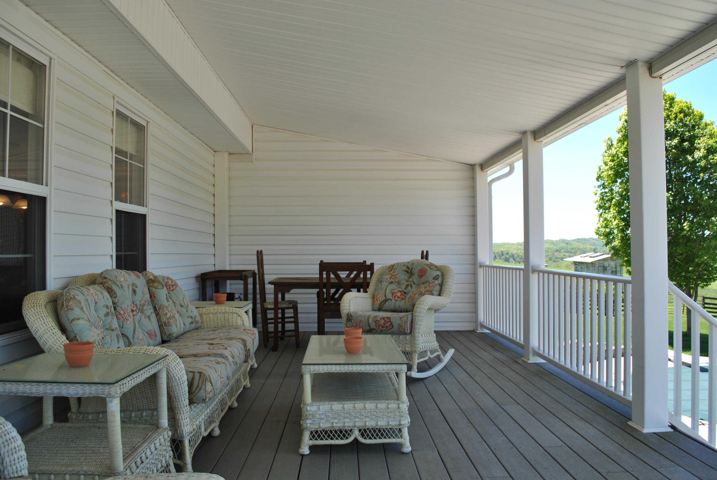1330 Huffville Road Northeast Pilot, VA 24138 - Photo 54 of 100 a balcony with furniture and wooden floor