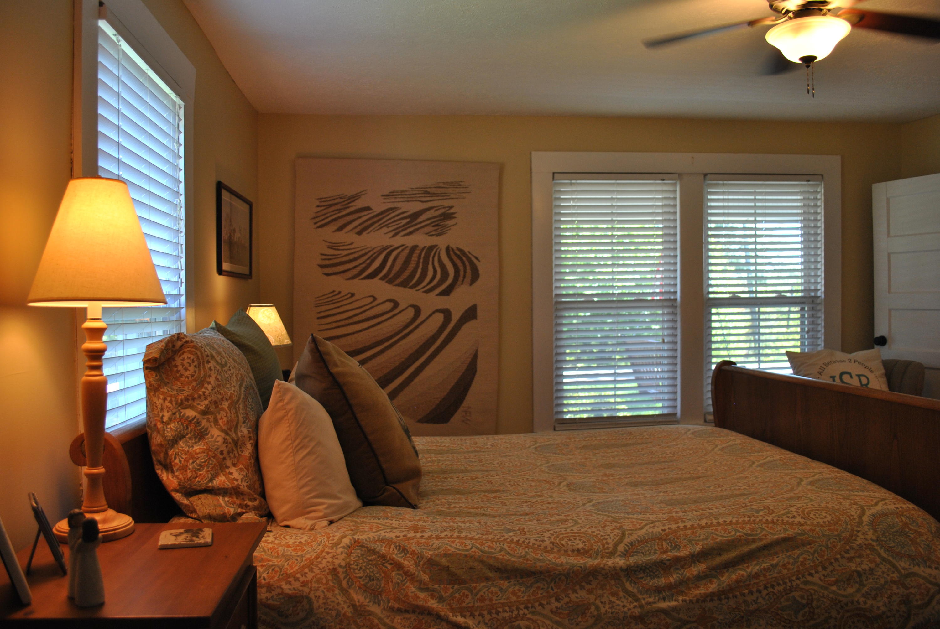 1330 Huffville Road Northeast Pilot, VA 24138 - Photo 60 of 100 a bedroom with a bed and a chandelier